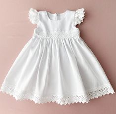 White cotton dress for baby girl. It can be used for baptism, christening, wedding, birthday. The fabric is natural cotton. The ruffles sleeved are made of natural lace. We can sew matching booties. bloomers and headband with the same lace as on the dress. The price is only for the dress. *Link for matching headband: https://www.etsy.com/listing/1448376512/baby-headband-baby-headband-bows-baby?click_key=1ff5a799e855b91c093ed4ff74e45fd71011c47c%3A1448376512&click_sum=0b71eb2c&ref=shop_home_active_1&sts=1 *shoes: https://www.etsy.com/listing/1462586117/baby-baptism-shoes-white-baby-booties?click_key=508860ad1e9a25f8a20eab09bf847aa261bdb695%3A1462586117&click_sum=3f65e01c&ref=shop_home_active_1&sts=1 *bloomers: https://www.etsy.com/listing/1448369992/white-baby-bloomers-baptism-girl-outfit?cl White Cotton Smocked Dress For Baptism, Cotton Baptism Dress With Lining, Cream Cotton Baptism Dress, Cute Cotton Baptism Dress For Dress-up, Girl Baptism Dress, White Baptism Dress, Embroidered Cotton Baptism Dress, Headband Bows, Dress For Baby Girl