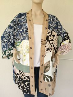 Boho Kimono Cardigan Plus size Kimono  Paisley Kimono Coat Kimonos Kimono Jacket This cardigan kimono is made of the cotton fabric. Cardigan will give you elegance and femininity.  Perfect in the fall season, like a light cape. Looks good with casual clothes, jeans or shorts. If you have any questions, write, I'm always ready to help you. Size  This cardigan is ready to ship . This cardigan fits size  SİZE - length: 83 cm - 33 in - sleeve length: 35 cm - 13 in - sleeve width: 23 cm / 9 in - shou Spring Outerwear With Patchwork And Kimono Sleeves, Bohemian Patchwork Cardigan For Summer, Beige Patchwork Cardigan For Spring, Spring Beige Patchwork Cardigan, Bohemian Floral Print Cardigan For Layering, Bohemian Patchwork Beach Outerwear, Casual Patchwork Kimono For Fall, Casual Multicolor Patchwork Kimono, Spring Open Front Patchwork Cardigan