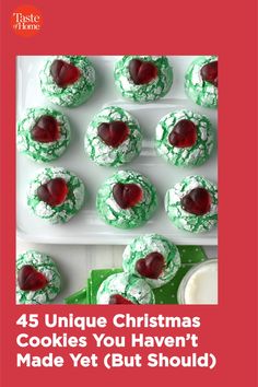 christmas cookies with white icing and green sprinkles are on a plate