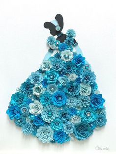 a blue dress made out of paper flowers