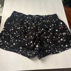 Pajama Shorts. Black And White Stars. Never Worn. Brand New. Size S 4-8 Casual Pajama Shorts With Elastic Waistband For Bedtime, Black Casual Bedtime Bottoms, Casual Black Bottoms For Bedtime, Black Shorts For Pajama Party, Black Bottoms For Summer Pajama Party, Casual Black Bottoms For Pajama Party, Black Bottoms For Pajama Party In Summer, Black Sleepwear With Elastic Waistband For Sleepovers, Casual Summer Bedtime Bottoms