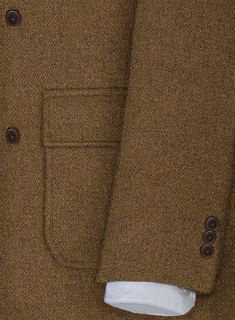 Perk up your ordinary formal wear with our tweed overcoat. Crafted from wool, the tweed outfit will be the perfect staple in your wardrobe that will take you from season to season in style.  
 
 Look Includes  Musto Royal Brown Heavy Tweed Fabric  Horn Brown Buttons  Peak Lapel (5 inch)  Single Vent   Three  Cuff Button   You can change the look during customization if required. 
 
 Lining: 100% Viscose; Dry Clean. Brown Tweed Jacket With Button Closure For Semi-formal Occasions, Classic Tweed Pea Coat For Formal Occasions, Formal Tweed Outerwear With Double Button Closure, Tailored Tweed Outerwear With Herringbone Pattern, Tweed Jacket With Double Button And Lapel Collar, Double Button Lapel Collar Tweed Jacket, Semi-formal Tweed Outerwear With Lapel Collar, Classic Formal Tweed Dress, Classic Wool Tweed Jacket With Herringbone Pattern