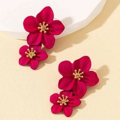 These Cut The Crap Flower Statement Earrings showcase a delicate flower design for a touch of elegance and style. 
 Crafted with precision and attention to detail, these earrings are the perfect accessory for any occasion. Made with high-quality materials, these earrings are built to last. Flower Statement Earrings, Built To Last, Delicate Flower, Attention To Detail, Flower Design, Flower Designs, Statement Earrings, Flowers, High Quality