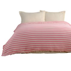 a pink and white striped comforter with two pillows on the bottom one has fray edges