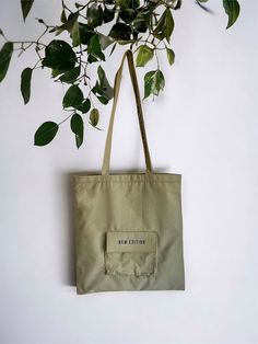 unique Upcycled/ reworked  army tote bag . With lining. perfect for any occasion. strap length 32.25 " length: 15.5" height : 16.5" Recycling Bags, Jean Tote Bag, Recycle Bag, Upcycle Jeans, Eco Chic, Khaki Green, Recycling, Etsy Accessories, Accessory Gift