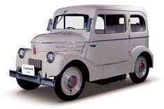 an old white truck is shown on a white background