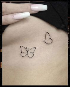 Simple Butterfly Tattoo Inspiration Small Black Butterfly Tattoo Simple, Butterfly Wrist Tattoos For Women Simple, Plain Butterfly Tattoo, Simple Butterfly Tattoo Design For Women, Small Outline Butterfly Tattoo, Small White Butterfly Tattoo, Butterfly Outline Tattoo Simple, Mini Butterfly Tattoo Simple, Simply Butterfly Tattoo