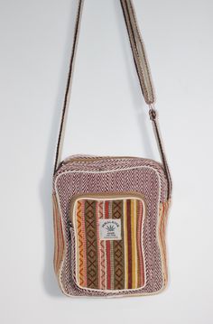 This Hemp Minimal Side bag have been beautifully handcrafted with cotton lining inside and is very sturdy. Carry all your essentials for your short trips either to a shopping mall or to your local grocery store. It's so light you can carry it all day without feeling it's even there. Material: 70% Cotton and 30% Hemp Size: 9 x 7 x 2 in Multicolor Cotton Shoulder Bag With Zipper Pocket, Natural Cotton Travel Bags, Eco-friendly Canvas Bag With Adjustable Strap For Daily Use, Brown Cotton Shoulder Bag With Zipper Pocket, Natural Cotton Shoulder Bag For Travel, Casual Zipper Pouch Bag As Gift, Casual Satchel As Gift, Casual Natural Shoulder Bag For Gift, Casual Natural Color Shoulder Bag For Gift