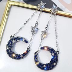 A Beautiful Crescent Moon Is Speckled With Jet Black And Navy Blue Crystals That Resemble Space. Cz Stars Finish The Look. Gift Boxed Hypo-Allergenic Posts Stainless Steel Spacecore Accessories, Gold Feather Earrings, Dark Earrings, Reality Shifting, Celestial Crystal, Silver Star Earrings, Space Jewelry, Mickey Mouse Earrings, Cat Earrings Studs