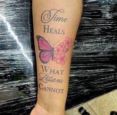 a woman's leg with a tattoo that says time heals what reason cannot not