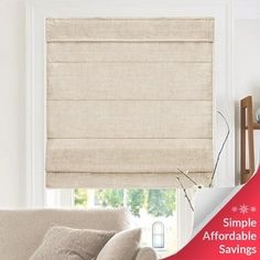 a living room scene with focus on the roman blind blinds and the text simple afforable savings