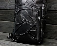 Handmade biker's black leather backpack Skulls in gothic style for men and women. Another piece from our author's collection of Leather Captivity. This bag is suitable for everyone who are not afraid to show their individuality. Strong and functional, high-quality accessories. Withstands any weather. Comfortable in using. Alternative Leather Bag With Zipper Closure, Alternative Style Leather Shoulder Bag With Zipper, Black Leather Punk Shoulder Bag, Black Leather Gothic Bags, Leather Shoulder Bag For Streetwear With Zipper, Gothic Leather Shoulder Bag With Zipper Closure, Black Leather Streetwear Shoulder Bag, Black Leather Shoulder Bag For Streetwear, Black Leather Bag For Streetwear