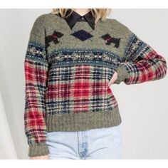 This vintage Ralph Lauren sweater is perfect for the cooler months of fall and winter. Made of 100% wool in a tight-knit style, it features a cute scottie dog hand-knit design in gray and red. The crew neck and pullover style add to the cozy feel. This sweater is recommended for dry clean only and is a size L. It's a great addition to any wardrobe, especially for those who love a holiday or 90s theme. Please refer to the provided aspects and categories for more details. Vintage Ralph Lauren Sweater, Handknit Design, 90s Ralph Lauren, 90s Theme, Knit Style, Pullover Sweater Women, Ralph Lauren Sweater, Scottie Dog, Knit Pullover