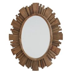 an oval mirror with wooden frame and sunburst design on the top, against a white background