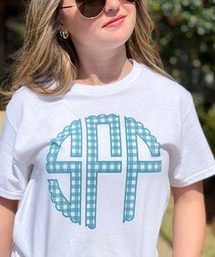 We are in love with this Gingham Monogram Shirt! 

GILDAN
Short Sleeve - 6.0 oz. pre-shrunk 100% cotton Preppy Cotton Tops With Letter Print, Summer Cotton Monogram Print Tops, Summer Cotton Tops With Monogram Print, Relaxed Fit Cotton Gingham Tops, Relaxed Fit Gingham Cotton Top, Preppy Cotton Tops With Graphic Print, Preppy Cotton Top With Graphic Print, Relaxed Fit Monogram Print Summer Tops, Cotton Monogram T-shirt For Spring