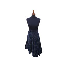 "This wonderful tartan skirt is made from finest wool. The skirt is fastened with six hook and eye fasteners. The predominant colours of the tartan are green and blue, but also include red and yellow. On the waistband you will find a tie on the left side which is 140 cm x 7.5 cm which can be adjusted to taste. The hem and lower skirt are decorated with pleats. Length = 50 cm - 75 cm Waist = 70 cm (due to the waistband tie there is some give in this figure) \"P\" Dry clean only" Scottish Style Plaid Lined Skirt, Scottish Style Fitted Plaid Pleated Skirt, Scottish Style Fitted Pleated Skirt, Fitted Scottish Pleated Skirt, Yellow Tartan Skirt, Skirt Elegant, Tartan Skirt, Elegant Skirt, Asymmetrical Skirt