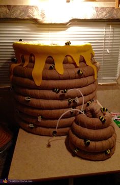 a large stack of donuts sitting on top of a counter