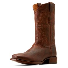 Our striking Stilwell boot is handcrafted by artisan boot makers in León, Mexico and infused with Ariat comfort features. Supple, strong and impressively durable American Bison leather gives this premium boot comfort and durability you can count on. Bench Made Stilwell Cowboy Boot | Product Features : 0 : Removable All Day Cushioning insole with genuine vegetable tanned, anti-odor leather sock liner that molds to your foot, 1 : Lemonwood pegged sole for durability and fit, 2 : Resolable stacked Western Goodyear Welted Boots For Fall, Rustic Ranch Boots With Moc Toe, Rustic Moc Toe Boots For Ranch, Goodyear Welted Moc Toe Boots For Ranch, Goodyear Welted Snip Toe Boots For Ranch, Goodyear Welted Moc Toe Boots For Rodeo, Rustic Square Toe Ranch Boots, Western Boots With Goodyear Welted Plain Toe, Western Goodyear Welted Work Boots For Fall