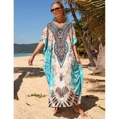 This Women's Suits Cover Up Beach Maxi Dress is a stunning piece that has been created using the beautiful hand-dying method of Indonesia. It will add a touch of style to your holiday wardrobe. The dress is versatile and can be worn during the day and night, as a gorgeous swimsuit cover-up at the beach, or as a glamorous evening dress. The wagging of the fabric creates a flattering and slimming silhouette and the dress is not too transparent. The open sides of the dress add a touch of sensuality Sarong Swimsuit Cover, Plus Size Beach Wear, Loose Summer Dress, Bohemian Summer Dresses, Plus Size Beach, Beachwear Collection, Beach Coverup Dress, Bathing Suit Covers, Beach Maxi Dress