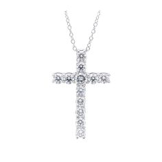 The Mavis Pendant Simple yet striking, this diamond cross is a beautiful reflection of her faith. Fashioned in 14K gold, this traditional cross is completely outlined with a glistening array of shimmering diamonds. Radiant with 2.00 carat total weight of I-J, VS-SI diamonds and a bright polished shine, this cross suspends along an 16 inch chain that has a two inch extension and secures with a lobster clasp. Sku number White Gold: 455168 Yellow Gold: 456475 Product Details Length: 28.6mm* Width 1 Formal Diamond Cross Necklace With Brilliant Cut, Anniversary Cross Necklace In Brilliant Cut Diamond White, Anniversary Cross Necklace In Diamond White With Brilliant Cut, Classic Diamond White Diamond Cross Necklace, Diamond Cross Necklace With Brilliant Cut, Classic Diamond Cross Necklace In Diamond White, Diamond White Brilliant Cut Cross Necklace, Diamond White Diamond Cross Necklace, Brilliant Cut Cubic Zirconia Cross Pendant Necklace