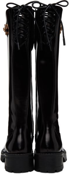 Knee-high patent calfskin boots in black. · Zip closure at inner side · Signature Medusa hardware at outer side · Lace-up detailing at heel collar · Buffed lambskin lining · Treaded rubber sole · Heel: H1.75 in Supplier color: Black Luxury Patent Leather Knee-high Boots With Pointed Toe, Formal Pointed Toe Patent Leather Knee-high Boots, Elegant Formal Boots With Glossy Finish, Elegant Glossy Finish Boots For Formal Occasions, Sleek Glossy Boots For Evening, Elegant Glossy Finish Formal Boots, Sleek Glossy Finish Evening Boots, Luxury Patent Leather High Heel Knee-high Boots, Luxury High Heel Patent Leather Knee-high Boots