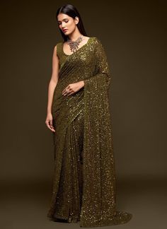 Take a risk with our Excellent Brown Sequins And Thread Designer Georgette Party Wear Saree! This saree is perfect for a festive reception or as a gift for your girlfriend. The intricate sequin and thread work will make you stand out and inspire others to take on new challenges. Don't wait, add this saree to your collection now! The unstitched blouse can be customized upto 42 inches. Do Note: All the accessories shown are for styling purpose only. Slight color variation may occur due to photogra Olive Green Saree, Engagement Event, Sequins Saree, Sequence Saree, Indian Wedding Sarees, Sequin Saree, Bridesmaid Saree, Fancy Saree, Desi Wear