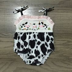 Brand New In Package Cute Black Bodysuit For Playtime, Cute Black Cotton Bodysuit, Black Playful Bodysuit For Casual Wear, White Sleeveless Printed Bubble Romper, White Printed Sleeveless Bubble Romper, Black Cotton Onesie For Summer, Printed White Bubble Romper, Cute White Sleeveless Bodysuit, Cute Printed Bodysuit For Playwear