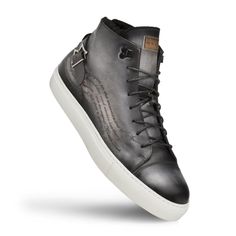 Style: Etched High Top Sneaker Grey Unique Patina High Top Sneaker from the Mezlan collection features one of a kind Engraving on Hand-Burnished Patina Calfskin, Faux Fur Lining, Monkstrap Detailing on the Heel, their injected memory foam cushioned insole and a full Rubber Cup Sole! Handmade in Spain. Cordovan Shoes, Hi Fashion, Shoe Horn, Shoe Tree, Sneakers Grey, Hi Top, Monk Strap, Handmade Shoes, Suede Shoes