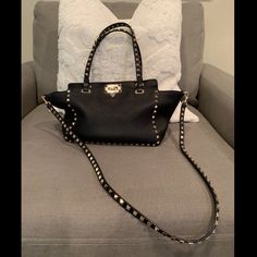 Authentic Valentino Rockstud In Black Leather With Detachable Strap. Comes With Dust Bag. Studded Shoulder Bag For Everyday Use, Crossbody Style, Studded Crossbody Bags For Everyday Use, Everyday Crossbody Bags With Studs, Evening Shoulder Bag With Studs, Studded Evening Shoulder Bag, Chic Studded Crossbody Shoulder Bag, Studded Leather Party Bag, Leather Party Bag With Studs, Elegant Leather Bag With Studs