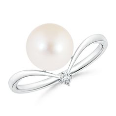 High on elegance and style, the pearl and diamond ring captivates your senses with its simplified design. The cultured Freshwater pearl exudes the beauty of the full moon while the solitaire diamond on the peak of the chevron band dazzles like the North Star. This classic pearl ring is sculpted in 14K white gold. Akoya Pearl Ring, Cultured Pearl Ring, Pearl Engagement Ring, The North Star, Pearl And Diamond Ring, Custom Wedding Rings, Chevron Ring, Ring With Diamond, The Full Moon