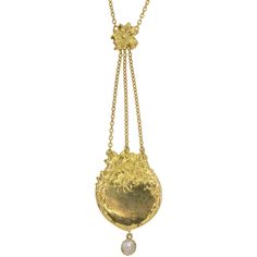 Antique Lavalier Necklace is a rare example of French Art Nouveau jewelry. The necklace features a beautiful flower rendered in rich 18k yellow gold with three chains resolving in a plaque of flowers encircling a textured field finished with a rose cut diamond drop. The plaque would have typically been engraved with the monogram for the wearer, this being open makes it a unique find. Perfect as a wedding or anniversary gift. Luxury Antique Etched Necklace, Formal Necklaces With Detachable Flower Pendant, Formal Necklace With Detachable Flower Pendant, Victorian Necklace With Detachable Pendant, Victorian Necklaces With Detachable Pendant, Gold Engraved Necklace For Evening, Evening Pendant Necklace With Rose Cut Diamonds, Gold Engraved Necklaces For Evening, Antique Evening Necklace With Rose Cut Diamonds