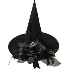 a black witches hat with flowers and pearls on the side, sitting on top of a white background