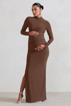 Sculpt your gorgeous growing silhouette in our latest maternity maxi dress. Alejandra. The perfect bodycon for that upcoming baby shower. this brown dress is designed in premium stretch jersey with long sleeves. a high neckline and a striking side split.Features- Premium stretch jersey- High neck- Long sleeves- Bump ruching- Invisible zip closure- Split hem- Maxi lengthSizing & FitModel is 5'8.5 and wears UK size 8 / US size 4Product InformationDesigned exclusively by Club L LondonDouble layered Brown Maternity Dress, High Neck Maxi Dress, Maternity Maxi Dress, Your Gorgeous, Maternity Maxi, Glamorous Dresses, Sequin Maxi Dress, Family Picture, Future Goals