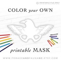 the printable mask with colored crayons in front of it and an image of a