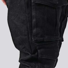 Introducing our mid-waist men's jeans from the 2023 Autumn Collection a perfect blend of couture and function!Why It's A Must-HaveDesigned to be a wardrobe staple. these jeans feature a conventional boot-flare silhouette that will never go out of vibe. With its mid-rise design. cargo pockets. and retro zipper and button closure. it's a perfect combination of fashion and function.Distinctive Features: Fashion-Forward: With a everlasting flare-leg silhouette and mid-waistline design. these jeans a Black Cargo Pocket Tapered Leg Jeans, Black Tapered Leg Jeans With Cargo Pockets, Black Tapered Leg Jeans With Patch Pockets, Black Jeans With Tapered Leg And Patch Pockets, Black Jeans With Hip Pockets For Fall, Winter Streetwear Jeans With Multiple Pockets, Washed Black Straight Leg Jeans With Multiple Pockets, Winter Washed Black Denim Bottoms, Urban Dark Wash Jeans With Hip Pockets