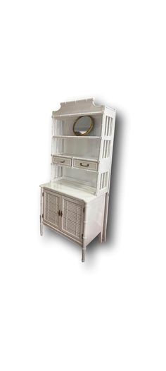 a white cabinet with drawers and a mirror on it's front door, against a white background