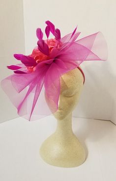 Beautiful hot pink wedding fascinator. It has an elegant a classy look. Great way to compliment your wedding, bridal shower, rehearsal dinner, cocktail party, Esther or church outfits. Adjustable headband. Hair clip may be added - Rear Find - Ready to ship - Lightweight - Fast shipping - Customize by adding different color flowers and or feathers Check my store for for styles and colors. etsy.com/shop/hatsandpearls Find more at my website: Www.hatsandpearls.com reach out to me if you can't find Hat Tea Party, Easter Hat, Hot Pink Weddings, Kentucky Derby Fascinator, Blue Fascinator, Pink Fascinator, Derby Fascinator, Pink Mask, Easter Hats