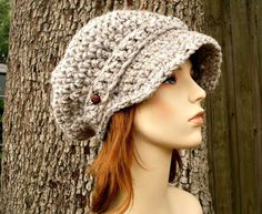 Crochet Hat Style: Newsboy Cap - a chunky crochet newsboy hat featuring a visor brim and decorative strap and buttons. Buttons may vary. For women, men and teens. Color: This sample hat is shown in Grey Marble. You can choose from 33 colors. Please see the last photos in the listing and zoom in for a visual reference of your color choices, then select it from the drop down menu when ordering.  Sizes: One size fits average teen or adult head size of 20" to 23" (50.5 cm to 58 cm). Fiber Content: 8 Newsboy Hat Pattern, Chunky Winter Hat, Chunky Crochet Hat, Crochet Newsboy Hat, Autumn Accessories, Crochet Hat With Brim, Crocheted Hats, Crocheted Hat, Mens Hat