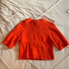 Free People Orange Women's Size Large Sweater That Is Cropped The Sleeves Go Down To About The Elbow With A High Neck Cut Out In The Back Area It Has Never Been Worn In Great Condition And Great Material Orange Winter Tops For Work, Orange Winter Workwear Tops, Spring Textured Knit Orange Top, Large Sweater, Large Sweaters, Free People Tops, Colorful Sweaters, Color Orange, High Neck