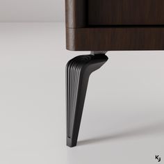 a close up of a wooden table with black legs