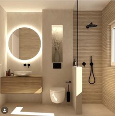 a bathroom with a sink, toilet and shower in it's center wall is illuminated by round mirrors