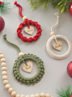 christmas ornaments are arranged on a table