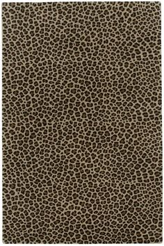 a brown and black animal print rug