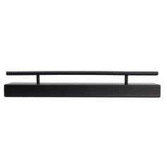 a black shelf with a metal handle on it's end and the bottom section is empty