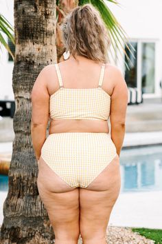 Feel just fine and sandy in this super chic swim top! We love the gingham pattern and figure flattering design! Throw on some cute sandals and accessories for your next beach or pool day. Simply pair this swim top with the matching bottoms for the perfect look! Gingham Swimwear For Sunbathing During Beach Season, Gingham Swimwear With Adjustable Straps For Poolside, Poolside Gingham Swimwear With Adjustable Straps, Vacation Gingham Swimwear With Adjustable Straps, Gingham Swimwear For Sunbathing, Gingham Swimwear For Beach Season Sunbathing, Gingham Swimwear For Sunbathing In Spring, Spring Gingham Swimwear For Sunbathing, Gingham Swimwear For Sunbathing In Beach Season