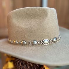 Beautiful, hand assembled hatbands. Easily adjusts to your hat size. Dress up your favorite summer hat or winter hat! Price is for 1 hatband.   Concho - oval silver nickel metal concho (20mm x 18mm); concho section is 21"; brown leather tie;   Easily fits most hat crowns with slider fastener. The conchos are sourced from hand-crafted  New Mexico artisans **Hat not included, price is for 1 hatband only ** Country Style Concho Hat Band For Rodeo, Western Hat Bands With Concho For Curved Brim, Wide Brim Hat Bands With Concho For Rodeo, Western Concho Hat Bands For Country Events, Adjustable Southwestern Felt Hat For Country Events, Southwestern Style Adjustable Felt Hat For Country Events, Southwestern Fedora Hat Bands For Ranch, Ranch Style Short Brim Hat With Concho, Concho Hat With Short Brim For Ranch