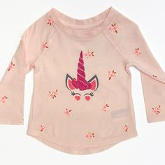 Toddler: Cat & Jack T-Shirt. Cotton Polyester Blend. Long Sleeve, Pull Over. Length Below Waist, Crew Neck. Embroidered Pink Unicorn. Machine & Tumble Dry Casual Unicorn Print Tops For Spring, Long Sleeve Cartoon Print Tops For Playwear, Unicorn Print Crew Neck Tops For Spring, Cute Long Sleeve Embroidered T-shirt, Playful Embroidered Crew Neck Top, Long Sleeve Embroidered Pink T-shirt, Fun Crew Neck Tops With Unicorn Print, Pink Long Sleeve Embroidered T-shirt, Casual Long Sleeve Tops With Unicorn Print