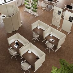 an overhead view of office cubicles with desks and chairs