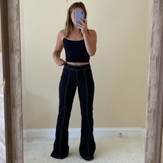 These Are So Cute But I’m Too Short For Them :( But They’re Stretchy & Very Flattering (Sizing Is Closer To A S) Black Mid-rise Pants For Loungewear, Trendy Fitted Black Wide Leg Pants, Fitted Wide Leg Black Yoga Pants, Black Fitted Wide Leg Yoga Pants, Black Stretch Wide Leg Mid-rise Pants, Black Stretch Mid-rise Wide Leg Pants, Casual High Waist Yoga Pants For Night Out, Casual Fitted Pants For Night Out, Black Fitted Yoga Pants