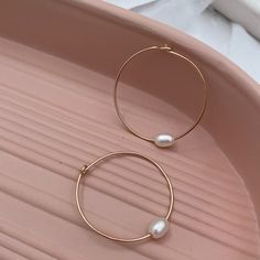 Hand-forged hoops featuring a single freshwater pearl are the perfect everyday accessory. Simple, clean, classic lines you'll never want to take off. Hand-made in our studio. These super lightweight hoop earrings are made of sterling silver or 14kt gold fill wire. Approximately 1 1/4 inch diameter. Single Pearl, Everyday Accessories, 14kt Gold, Hand Forged, Fresh Water, Freshwater Pearls, Gold Filled, 4 Inch, Hand Made